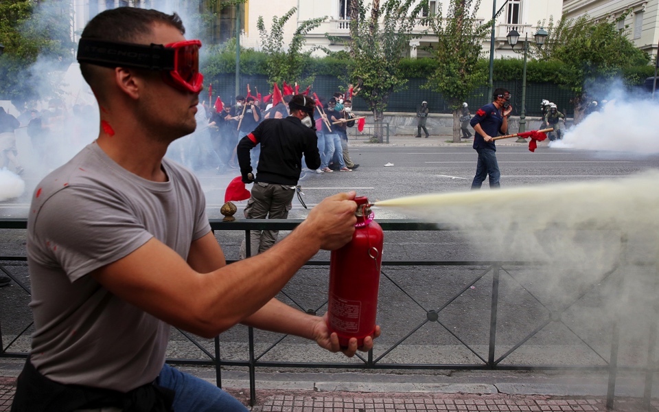 Greek students clash with riot police during protest against education reforms