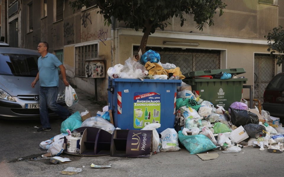 Trash cleanup to begin as politicians promise no layoffs