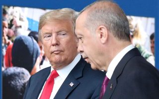 Scrambling to limit damage, Trump tells Turkey to stop its Syria invasion