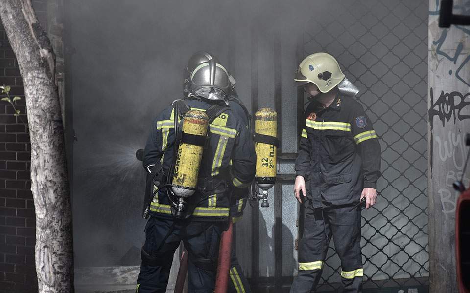 Firefighters tackle basement blaze in central Athens