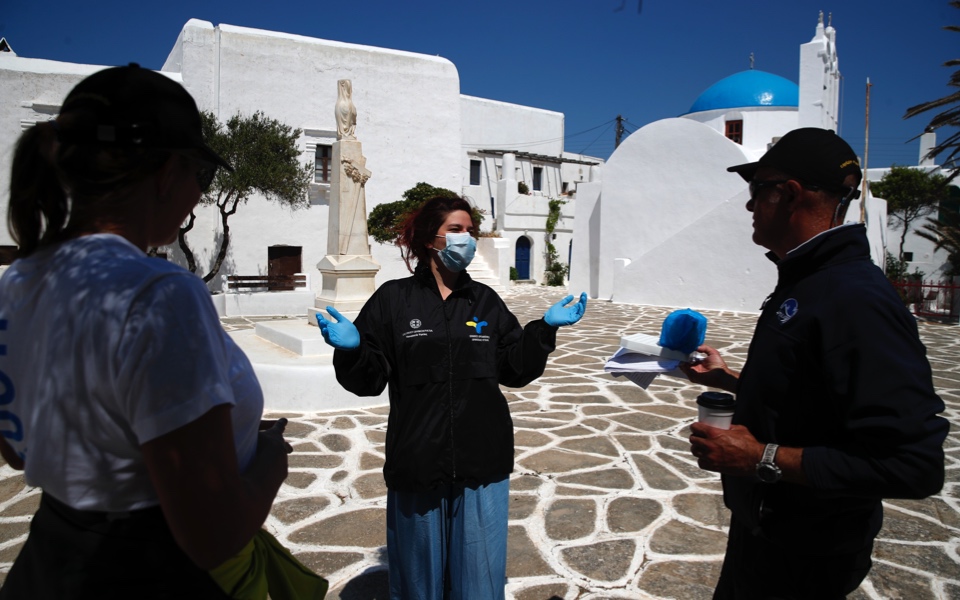 Doctors use GPS, dinghies to screen Greek islands for virus