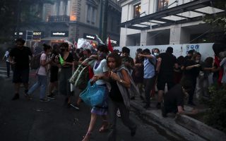 Greek police use teargas on crowds protesting demonstration law