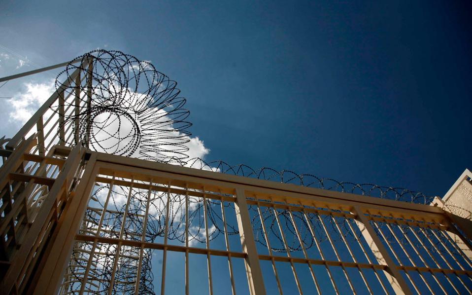 Covid outbreak infects at least 65 inmates in Greek prison