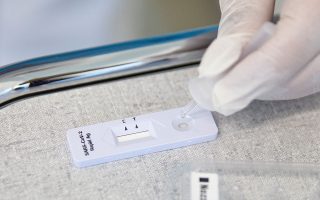 Critics warn virus test price caps may slash testing