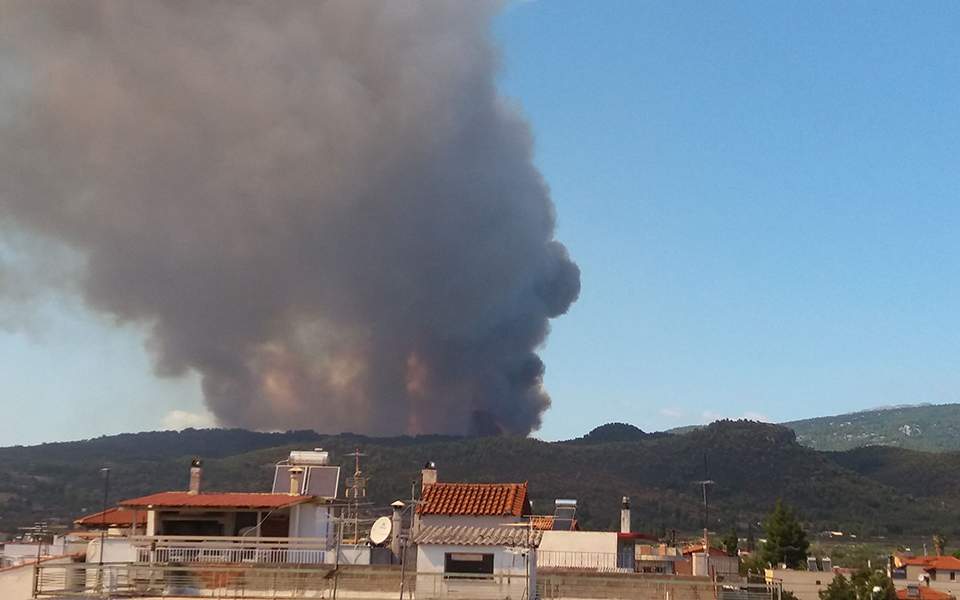 Firefighters battle  blaze in Evia