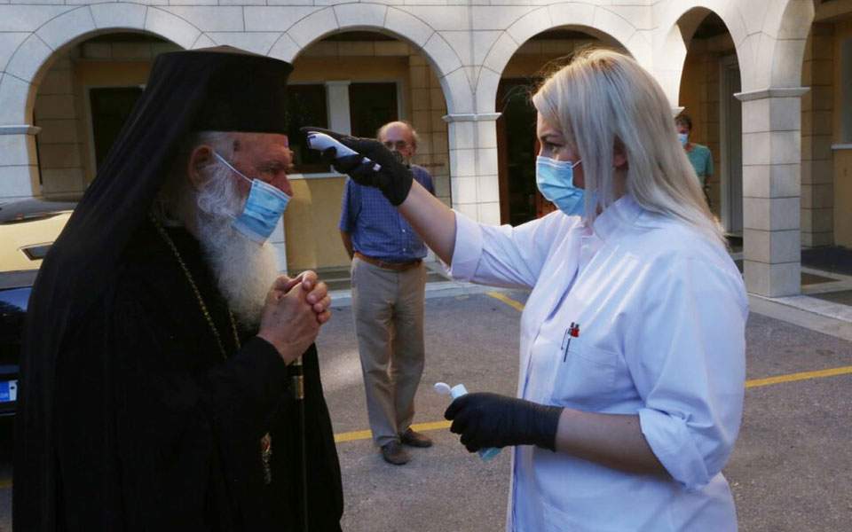 Archbishop wears mask to Holy Synod meeting