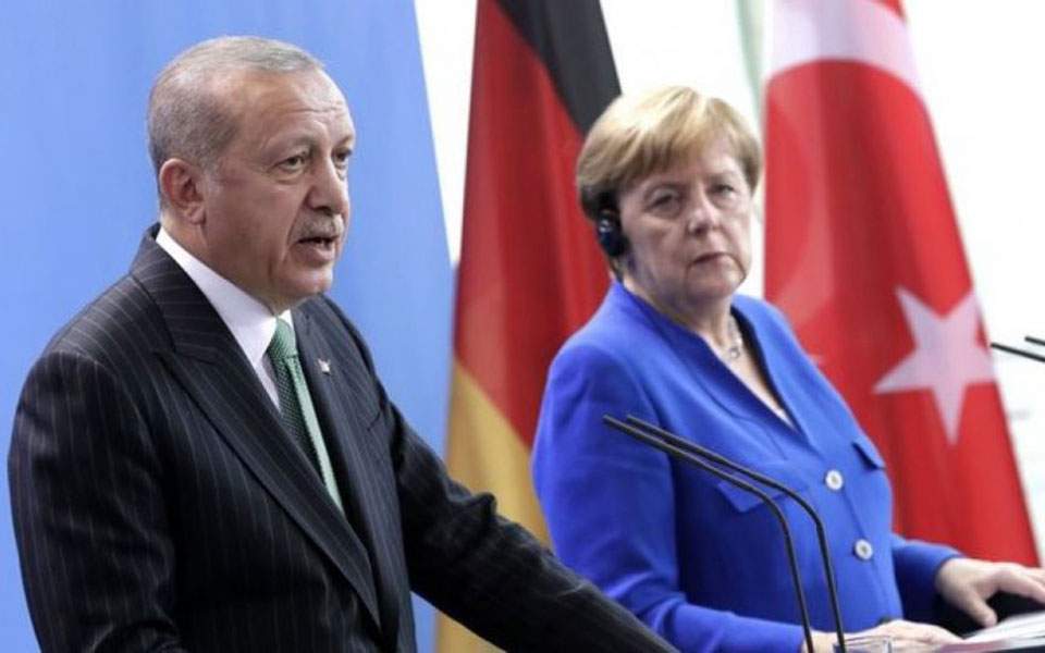 Erdogan tells Merkel EU summit resolution was not enough