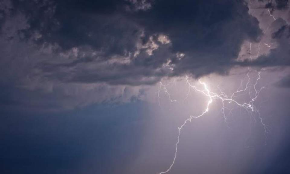 Two killed by lightning as rain wreaks widespread problems