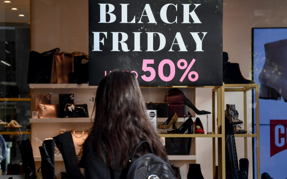 Shoppers buy into Black Friday, albeit reluctantly