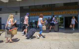 Britons rush to leave Greek islands ahead of new travel rules