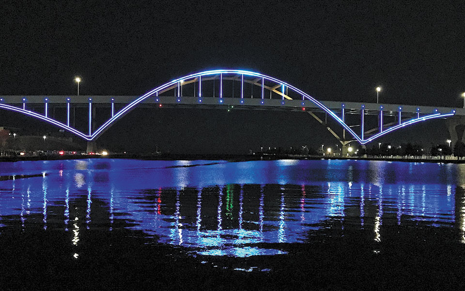 Milwaukee bridge lit in colors of Greek flag