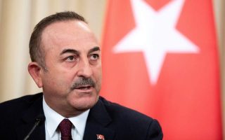 Cavusoglu insists Turkish troops stay in any Cyprus peace deal