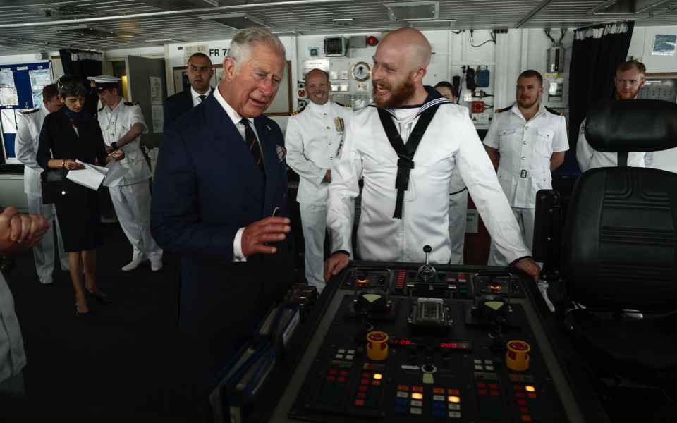 Britain’s Charles visits port of Piraeus