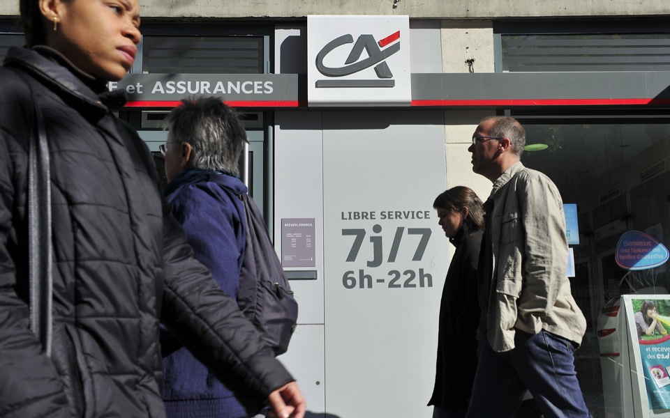 Credit Agricole sells Greek life insurance unit to cement exit
