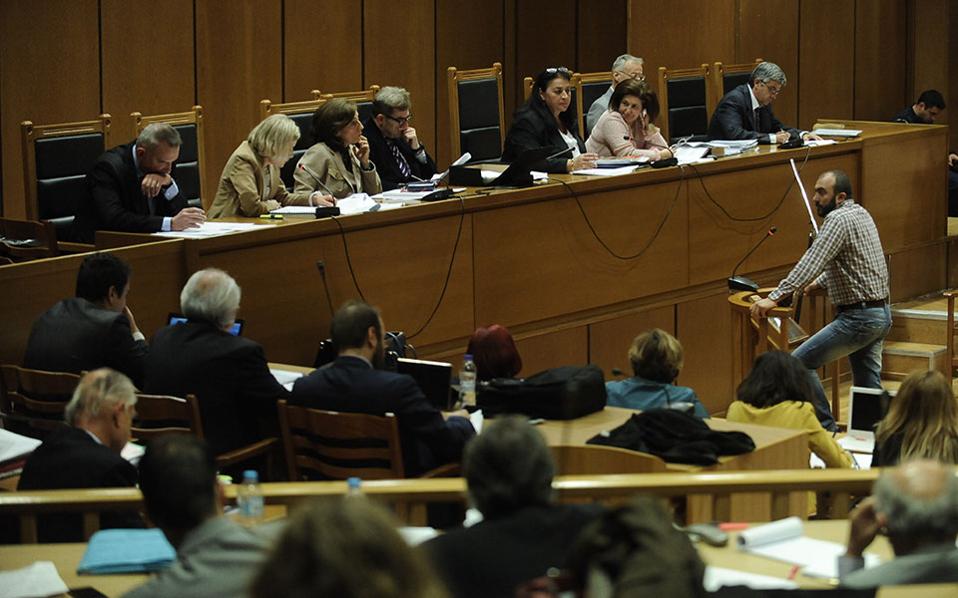 Judge calls recess in Golden Dawn trial during scuffles