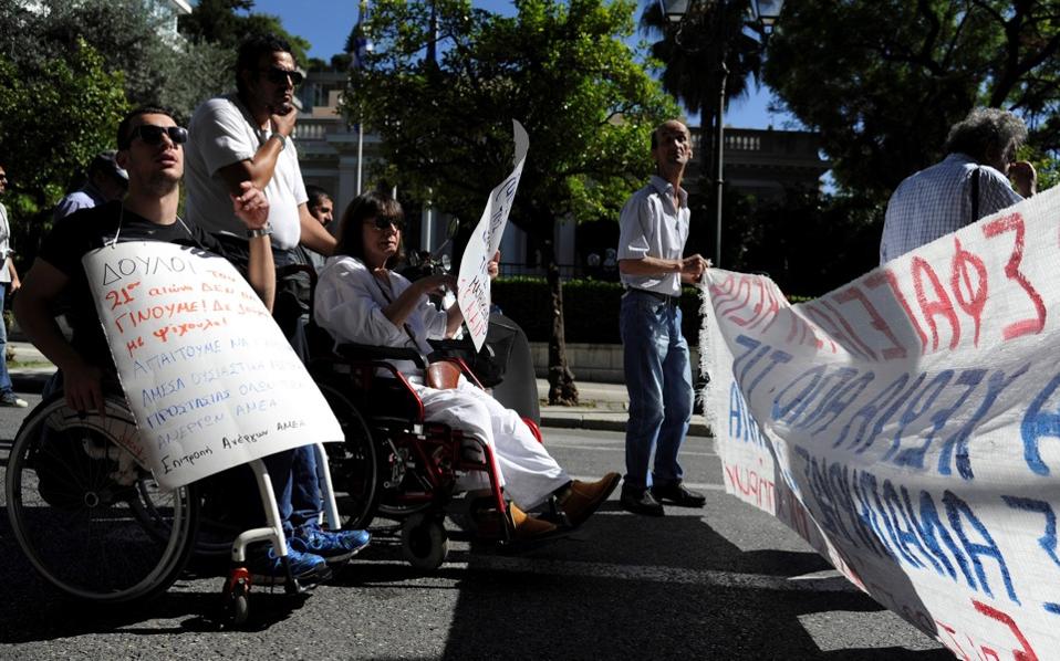 Disabled protesters rally against cutbacks in Athens