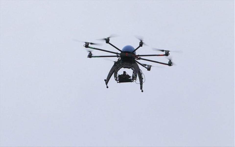 Police drone falls on roof of Athens apartment building