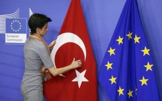Turkey says it has met EU visa deal criteria, delay unacceptable