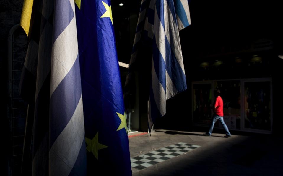 EU: Greek parliament vote satisfies bailout deal terms