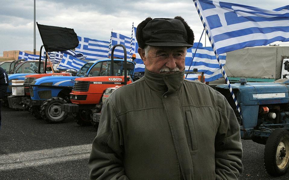 Greek farmers end road blockades over pension reform ahead of bailout talks