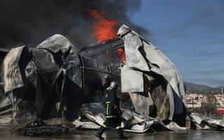 Paper warehouse blaze covers northern Athens in smoke