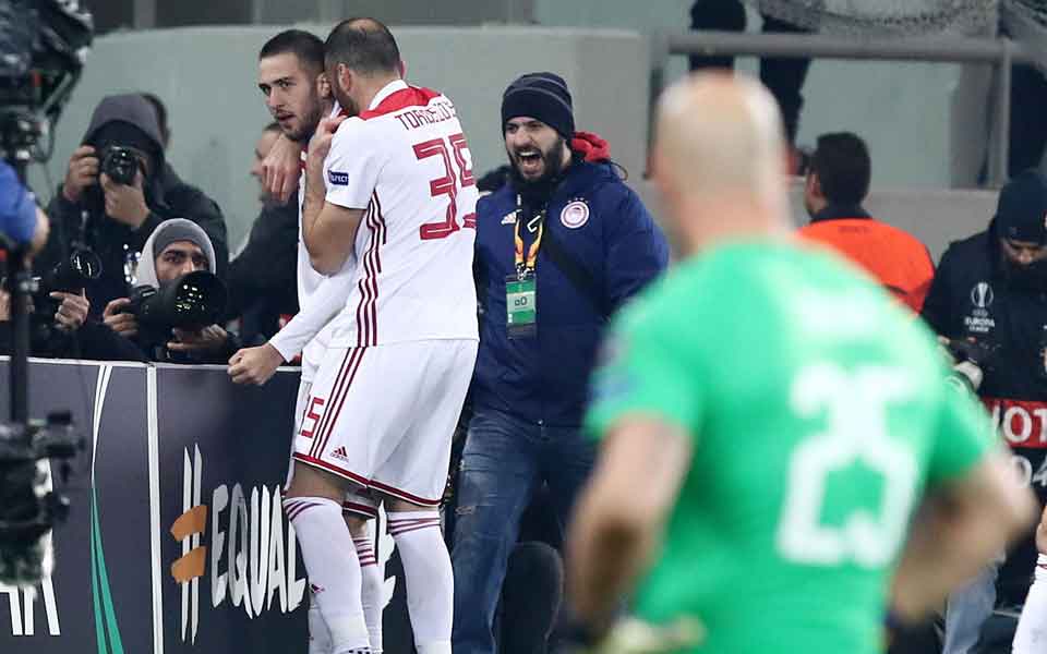 Olympiakos sends AC Milan crashing out of Europe