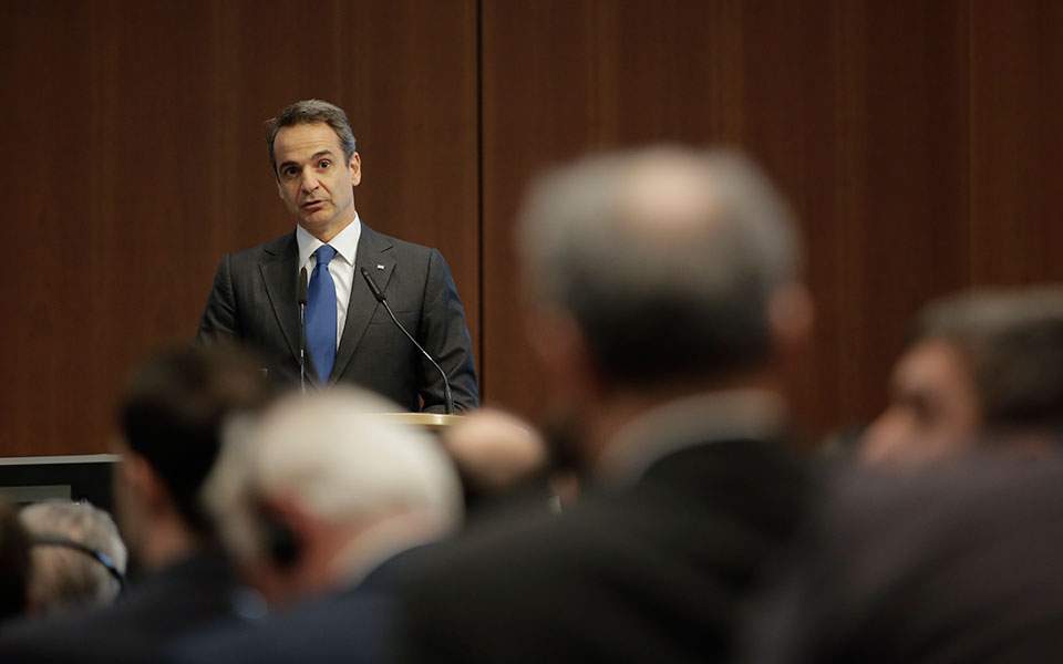 Mitsotakis calls on Turkey to remove migrants stuck in buffer zone