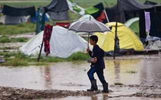 Rain aggravates conditions at refugee camp near Idomeni