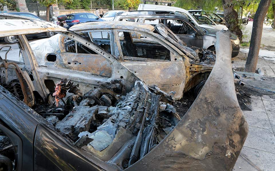 Nine detained over torched cars in central Athens