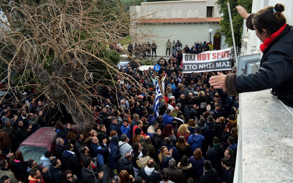 Greek islanders march against migrant facility