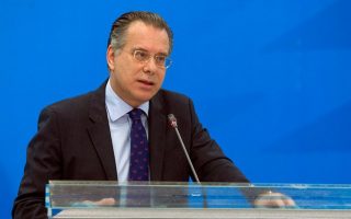 Greek government to proceed with closed migrant centers, says Koumoutsakos