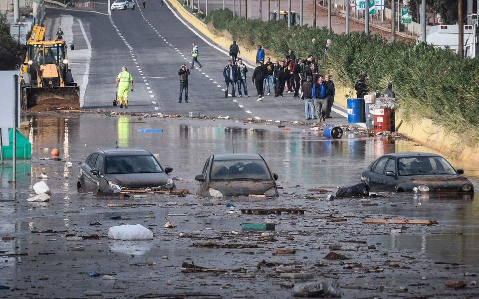 Two dead as downpour near Athens floods roads, traps residents