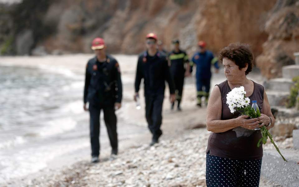 Death toll from Greek forest fire rises to 93, victims named