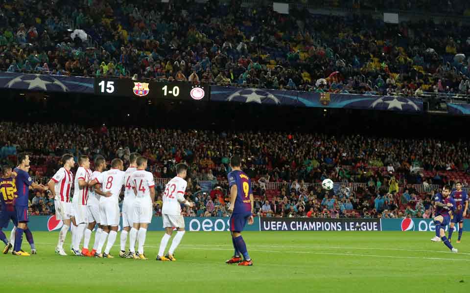 Olympiakos outclassed by 10-man Barcelona