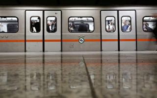 Passengers mask up on the Athens metro