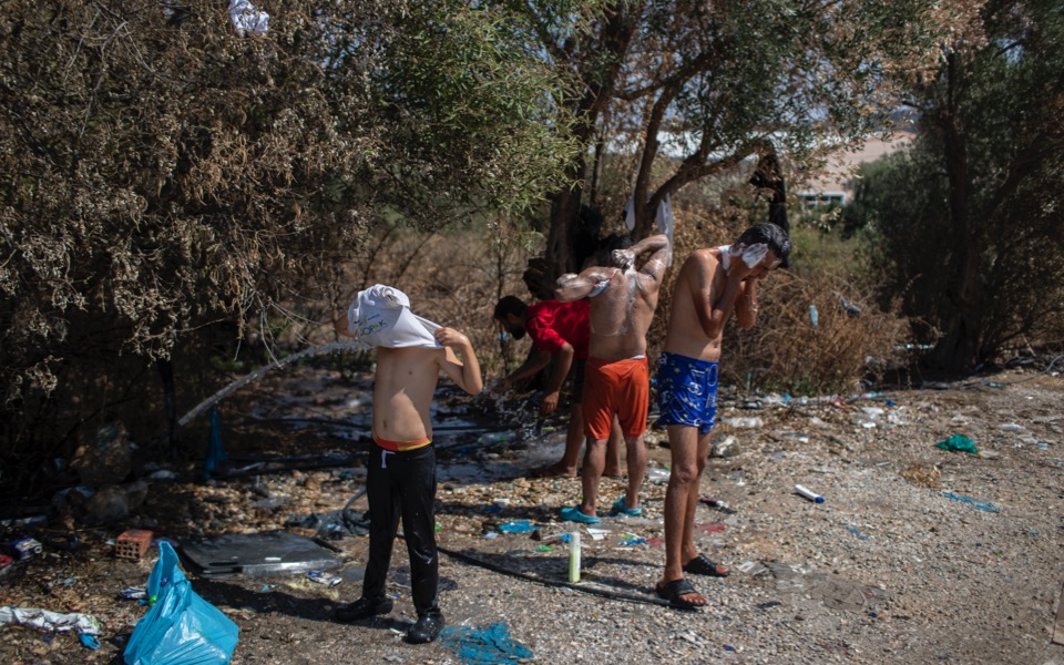 Mitsotakis promises permanent migrant centre after fire on Lesvos
