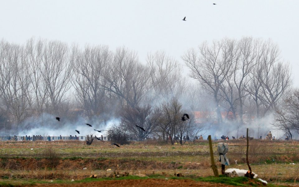 Greek troops fire tear gas at migrants gathering again at Turkish border
