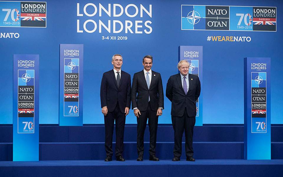 Mitsotakis slams Turkey-Libya deal at NATO gathering