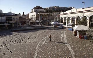 Once-bustling Monastiraki Square is almost deserted