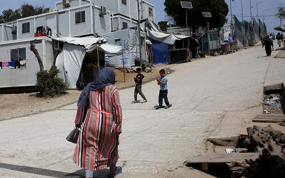 Half of Moria migrant camp population is women and children, NGO says