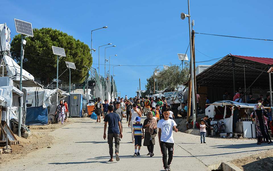 Migrant camps on islands put on lockdown