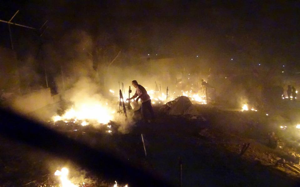 Many arrested after fires break out in and around Chios refugee, migrant camp