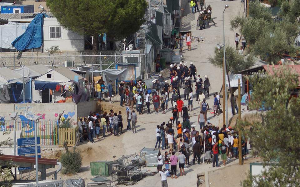 Migrants clash with farmers on Chios; riot breaks out in Lesvos camp