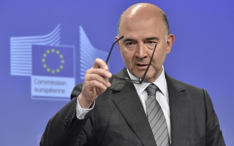 EU’s Moscovici sees deal on Greek loans, fair solution on debt