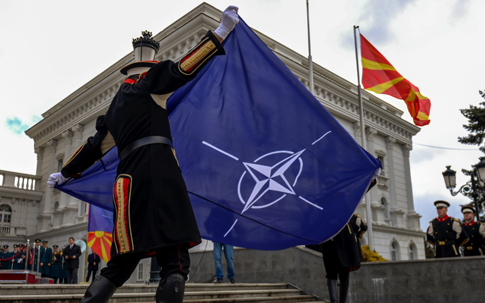 NATO flag hoisted alongside FYROM flag at government building in Skopje