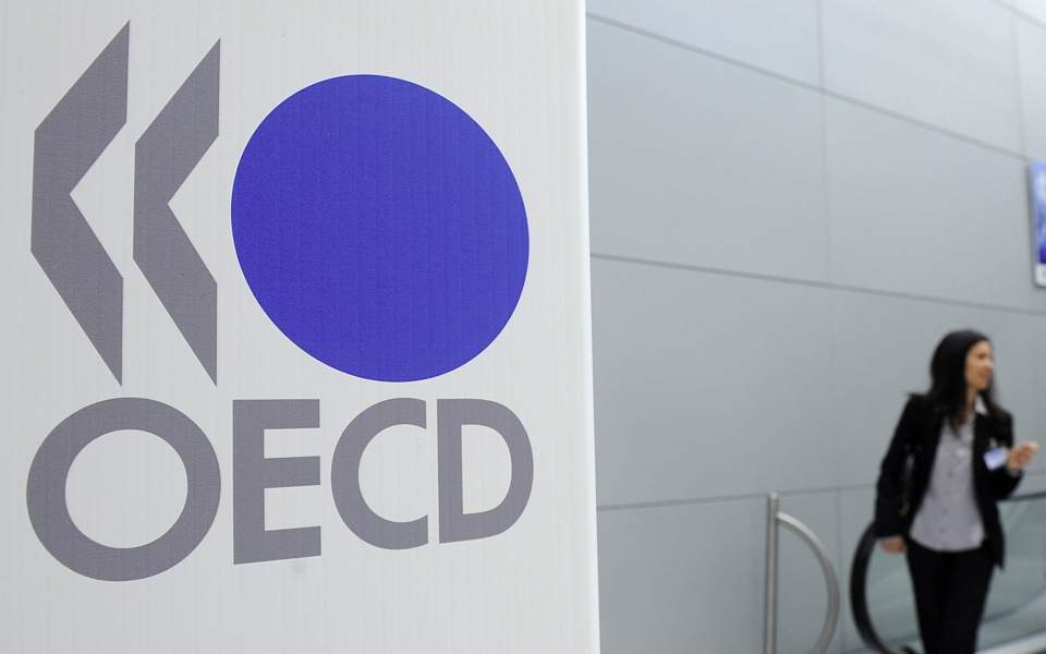 OECD sees Greek economy growing 2.4% this year