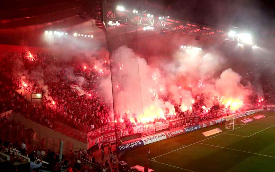 Reds thrash AEK in derby, as Greens go alone on top