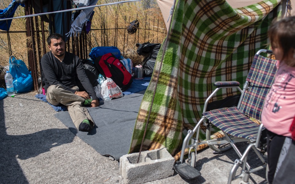 In Greece, a migrant’s dream of walking is set back by fire