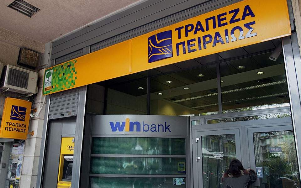 Piraeus Bank turns in quarterly profit, bad loan provisions drop