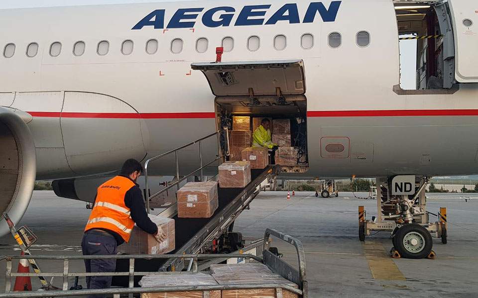 Aegean Airlines flight arrives in Athens with 1.7 million surgical masks from China